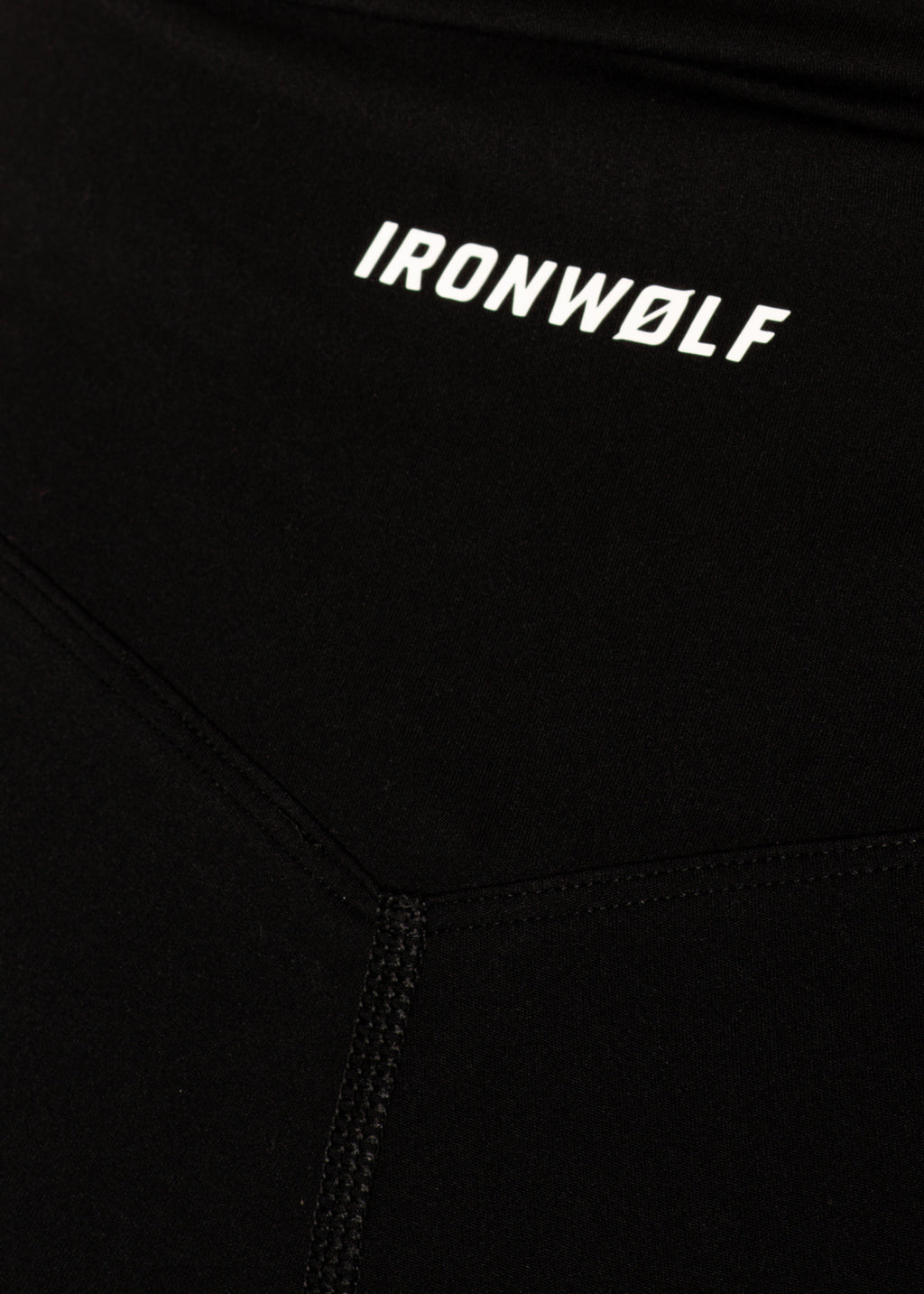 Black performance activewear with IRONWØLF logo, designed for gym training and movement