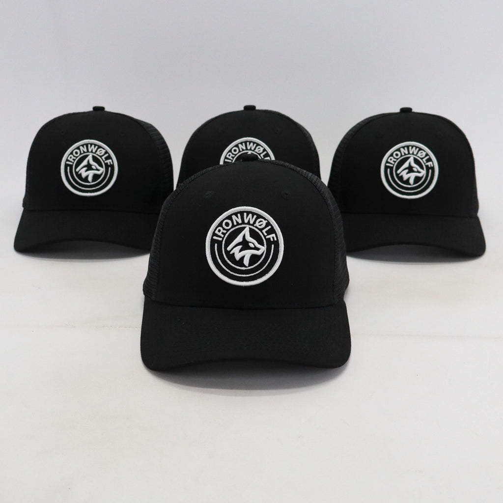Black IRONWØLF trucker hats with white wolf logo, perfect for gym and active lifestyle wear