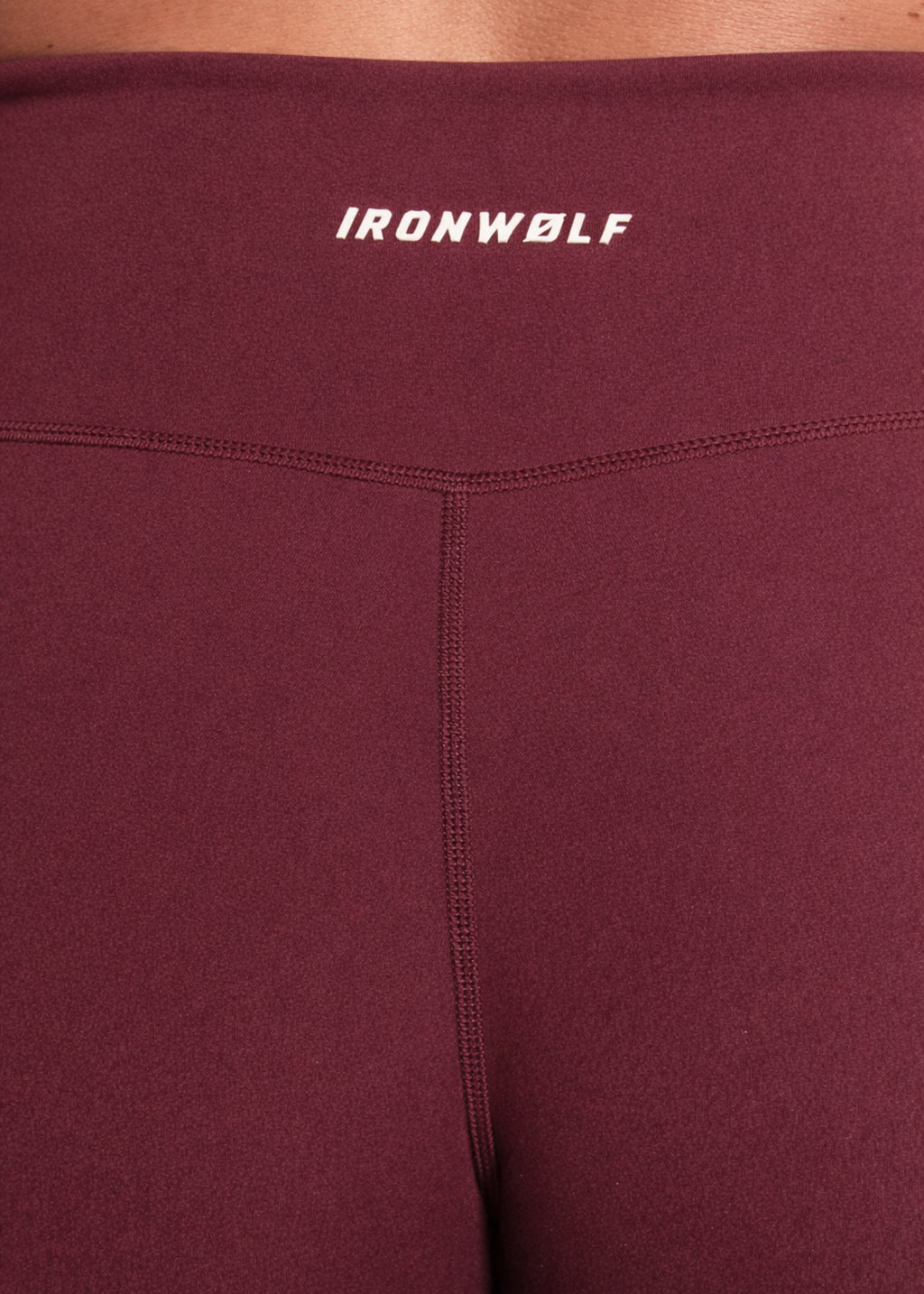 Maroon high-performance gym leggings with IRONWØLF logo, designed for comfort and movement during training.